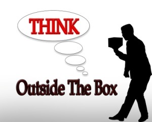 bigstock-Business-Slogan-Think-Outside-2655625